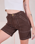 Railroad Carpenter Shorts in Fudgesicle Brown front close up on Alex