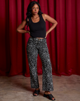 Work Pants in Spiderwebs and black Cropped Tank worn by Kandia