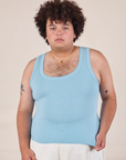 Miguel is 6'0" and wearing 2XL Tank Top in Baby Blue