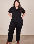 Ashley is 5'7" and wearing 1XL Short Sleeve Jumpsuit in Basic Black