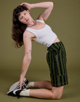 Longline Work Shorts in Evergreen and Cropped Tank in Vintage Tee White worn by Alex