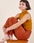 Work Pants in Burnt Terracotta on Soraya wearing spicy mustard Sleeveless Essential Turtleneck