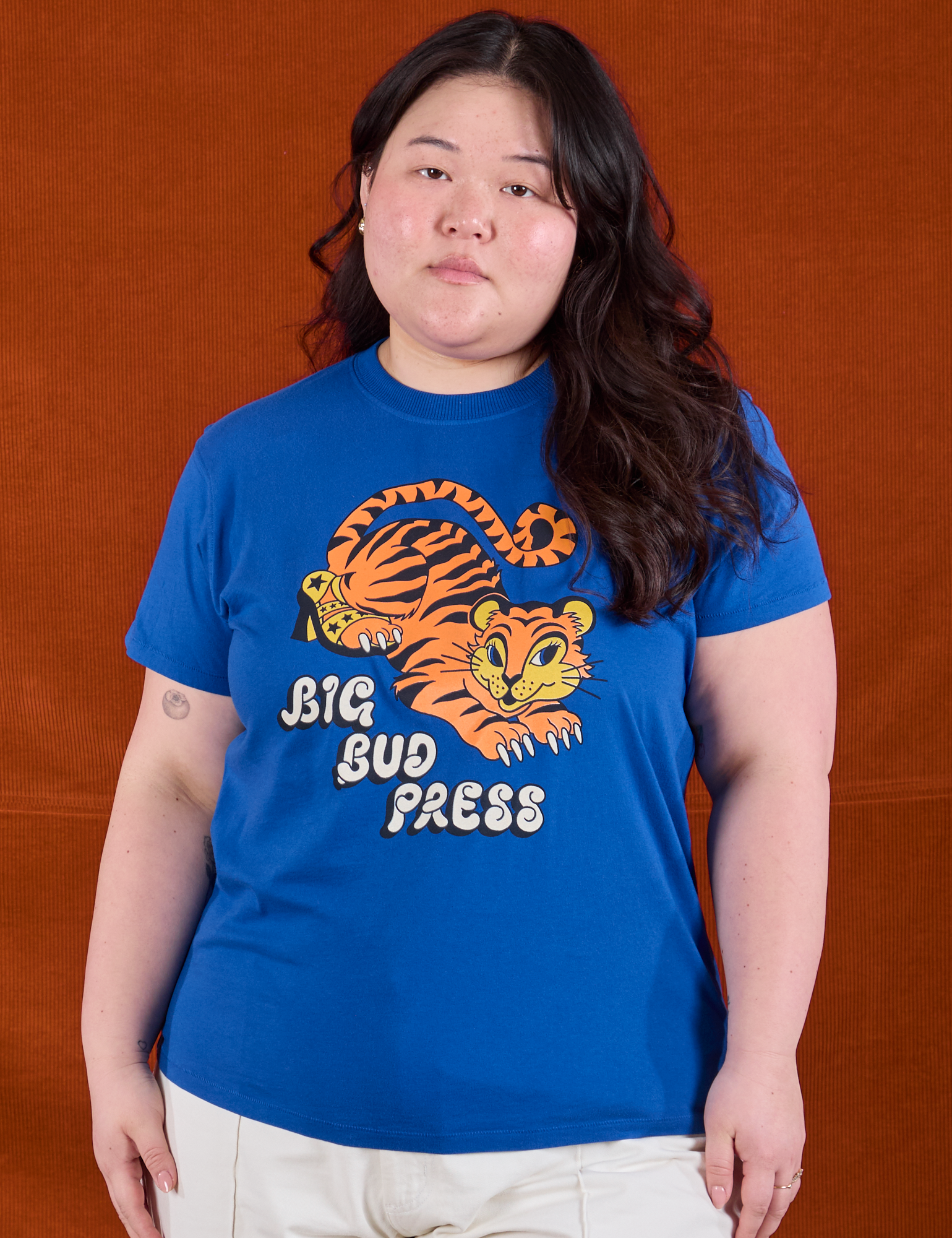Ashley is 5'7" and wearing L BBP Tiger Tee