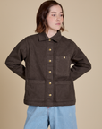 Hana is 5'3" and wearing P Denim Work Jacket in Espresso Brown