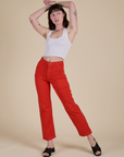 Work Pants in Mustang Red and Cropped Tank in Vintage Tee White on Alex