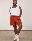 Elijah is 6’0” and wearing 3XL Classic Work Shorts in Paprika paired with Cropped Tank Top in vintage tee off-white