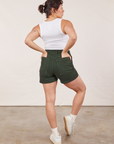 Back view of Classic Work Shorts in Swamp Green and Cropped Tank Top in vintage tee off-white on Tiara