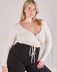 Lish is wearing Wrap Top in Vintage Tee Off-White