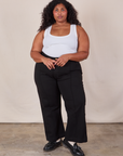 Morgan is 5'5" and wearing 2XL Western Pants in Basic Black paired with a Cropped Tank in Vintage Tee Off-White