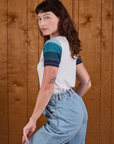 Angled back view of Calypso Tee in Ocean on Alex