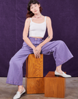 Alex is wearing Overdyed Wide Leg Trousers in Faded Grape and Cropped Cami in vintage tee off-white