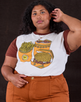 Morgan is 5’5’” and wearing L Anniversary Tee in Fast Food