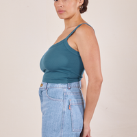 Side view of Cropped Cami in Marine Blue and light wash Sailor Jeans worn by Tiara