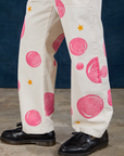 Paintstamped Work Pants in Bubblegum pant leg close up on Isaac