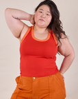 Ashley is 5'7" and wearing L Colorblock Cropped Tank in Mustang Red