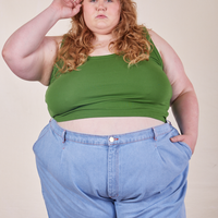 Catie is 5'11" and wearing 4XL Cropped Tank Top in Lawn Green