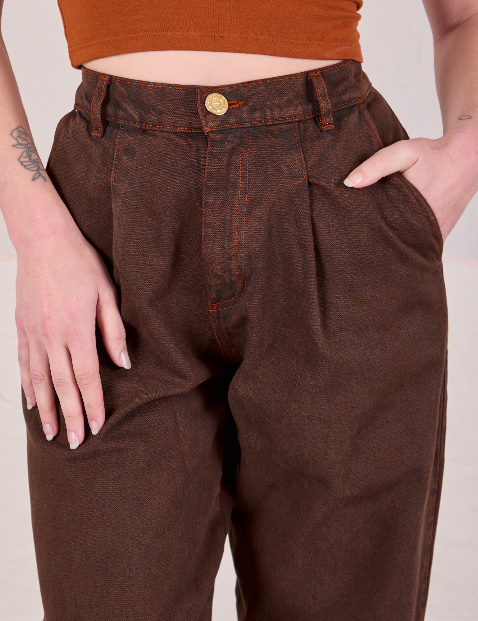 Overdyed Denim Trouser in Fudge front close up on Alex