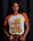 Kandia is 5'3" and wearing XXS Short Sleeve Raglan Tee in Haunted House