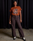 Kandia is wearing Vintage Tee in Spidey and espresso brown Work Pants