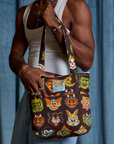 Halloween Masks Shoulder Zip Tote held by Jerrod