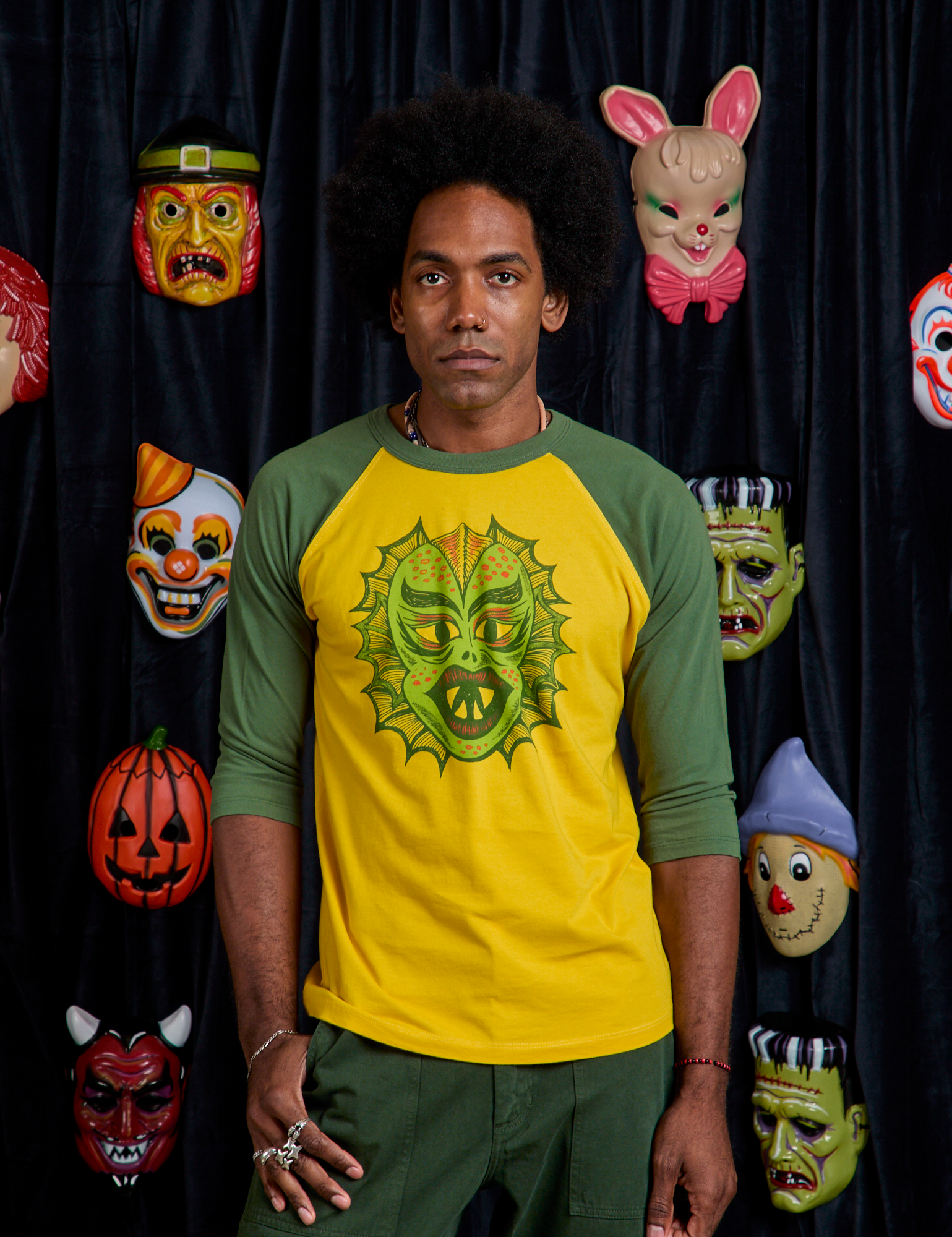 errod is 6'3" and wearing M Raglan Tee in Creature