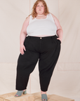 Catie is 5'11" and wearing 4XL Heavyweight Trousers in Basic Black paired with Cropped Tank Top in vintage tee off-white