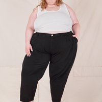 Catie is 5'11" and wearing 4XL Heavyweight Trousers in Basic Black paired with vintage off-white Cropped Tank Top