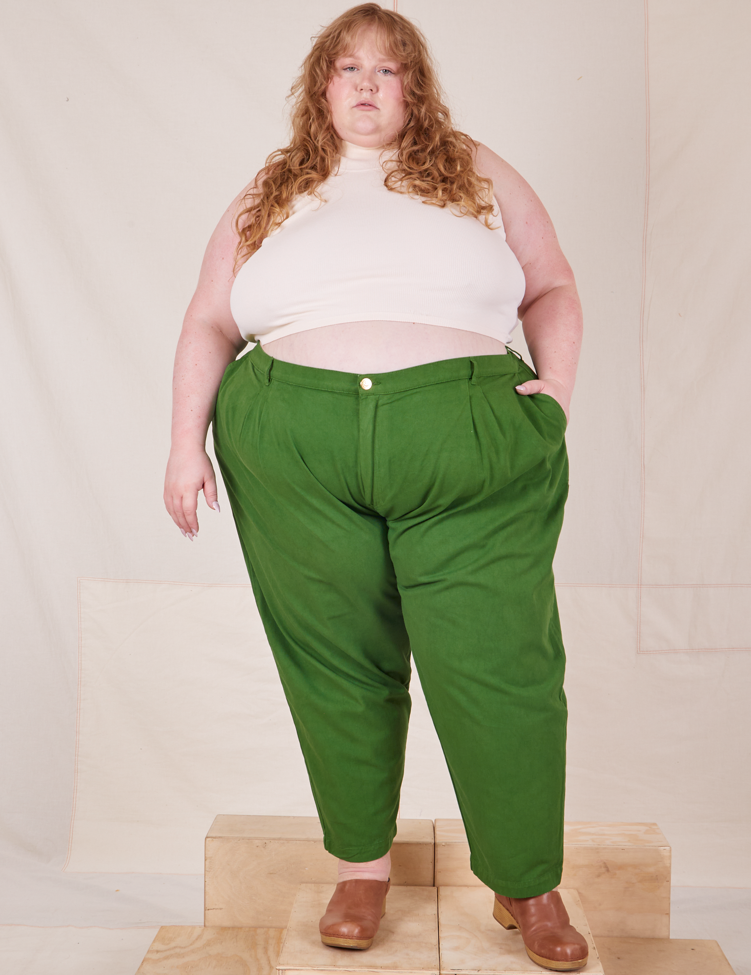 Catie is 5&#39;11&quot; and wearing 4XL Heavyweight Trousers in Lawn Green paired with Sleeveless Turtleneck in vintage tee off-white