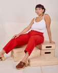 Tiara is wearing Heavyweight Trousers in Mustang Red and Cropped Cami in vintage tee off-white 