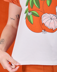 Anniversary Tee in Orange Blossom front close up on Alex