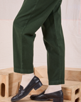 Heritage Trousers in Swamp Green pant leg close up on Alex
