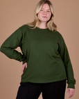 Lish is 5’8” and wearing S Long Sleeve Burly Tee in Evergreen