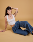 Baggy Mid-Rise Trousers in French Blue and vintage tee white Cropped Tank on Alex