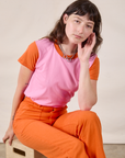 Mismatched Tee in Pink & Orange and construction orange Work Pants on Alex