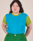 Ashley is 5’7” and wearing L Mismatched Tee in Blue & Green