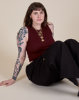 Muscle Tee in Red Wine and black Drop Pocket Cargo Pants worn by Sydney