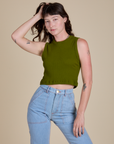 Alex is 5’8” and wearing XP Muscle Tee in Summer Olive