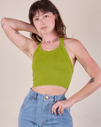 Alex is 5'8" and wearing P Halter Top in Gross Green