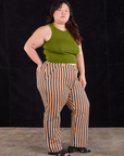 Side view of Work Pants in Autumn Stripe and summer olive Racerback on Ashley