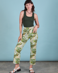 Alex is 5'8" and wearing XXS Work Pants in Ocean and Sky paired with a swamp green Tank Top