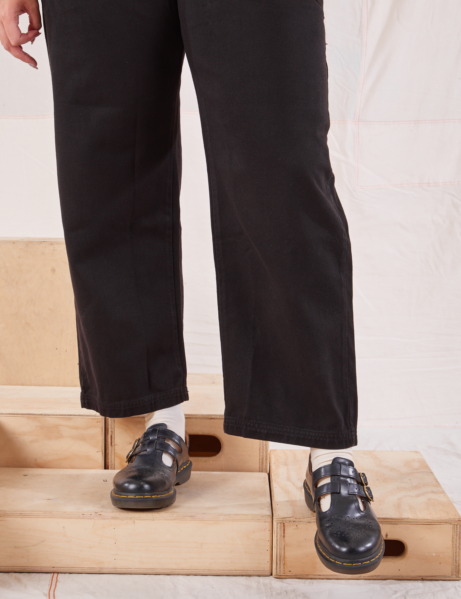 Organic Work Pants in Basic Black pant leg close up on Ryan