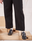Organic Work Pants in Basic Black pant leg close up on Ryan