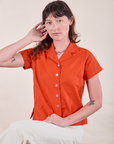 Alex is 5'8" and wearing P Pantry Button-Up in Chili Red