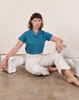 Alex is wearing Pantry Button-Up in Marine Blue