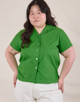 Ashley is 5'7" and wearing L Pantry Button-Up in Kelly Green