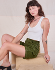 Railroad Carpenter Shorts in Summer Olive and Cropped Tank in Vintage Tee Off-White worn by Alex