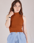 Hana is 5'3" and wearing P Sleeveless Essential Turtleneck in Burnt Terracotta