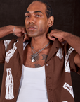 Soda Bottle Pantry Button-Up in Fudgesicle Brown close up on Jerrod