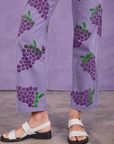Paintstamped Work Pants in Grape pant leg close up on Madeline