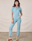 Alex is 5'8" and wearing XXS Short Sleeve Jumpsuit in Baby Blue